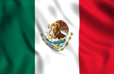 Mexican flag waving in the wind.