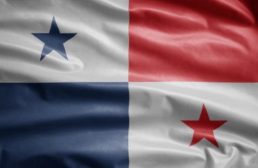 Panamanian flag waving in the wind. Close up of Panama banner blowing soft silk.